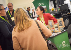 Spring Zhu with Sangreen was busy explaining customers about the complete greenhouse projects the company takes on.