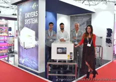 The Vifra team showing their dryers system