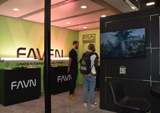 Explaining at the booth of Faven Lighting