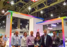 Eric Moody, Christine Stein, Megan Foley, Todd Philips, James Grouzos, Steven Szewczyk in the colourful and bright booth of P.L. Light Systems.