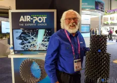 Tom Robertson with Air-Pots. Thanks to the shape of the pots, the plants are enhanced to develop a mass of healthy fibrous roots.