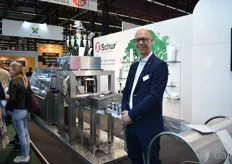 Marcel Leijten in front of Schur and Ishida’s automated solution for cannabis processing. The system precisely weighs the buds and packages them, saving lots of manual labor.