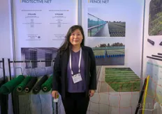 WeiHai Xing Hai Lian produces plastic nets and mats for greenhouse and fruit producing purposes, to manage weeds, wind, sun, bugs. On the photo is Jane Ci.