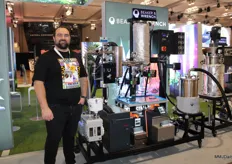 Trevor Wallace of Beaker & Wrench. In the background you can see one of their solutions: wiped-film evaporation for quickly producing bulk botanical oils