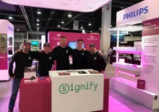 The Signify team looking happy to show off the grow lights to the many visitors